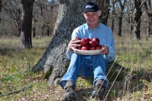 Buks Nel under a tree with Bigbucks